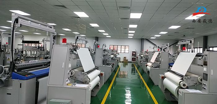 1663925278856644.jpg 織物在檢測.jpg